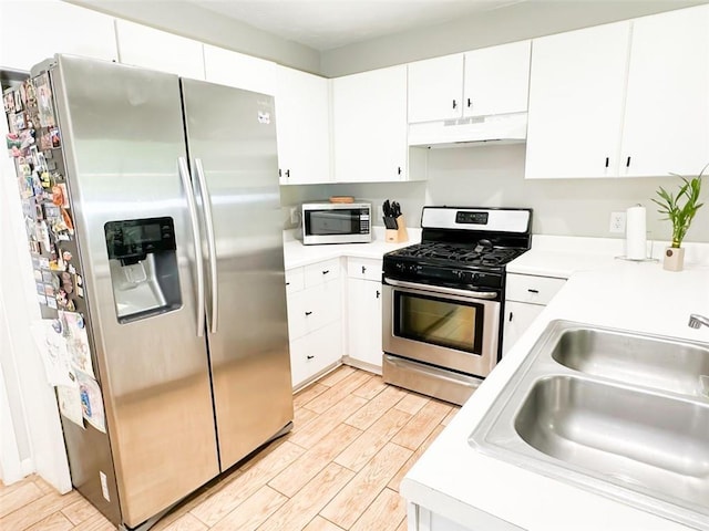 320 Kentshire, Lawrenceville, GA 30044 - kitchen featuring white cabinetry, stainless steel appliances, and sink