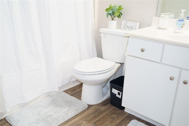 320 Kentshire, Lawrenceville, GA 30044 - bathroom featuring vanity, toilet, and hardwood / wood-style floors