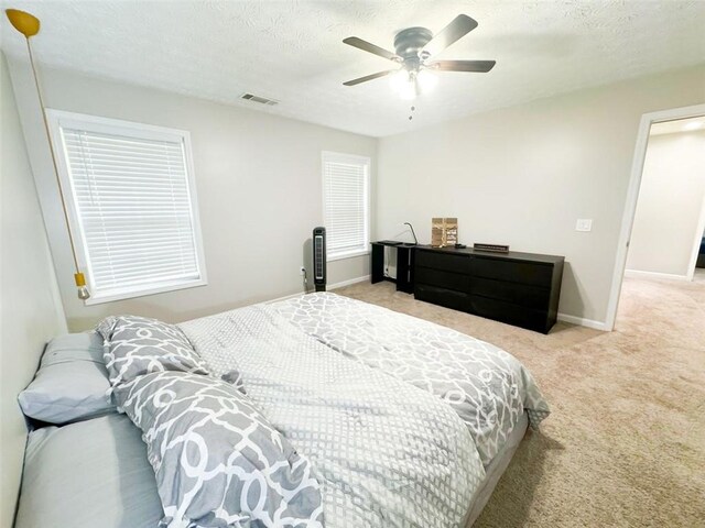 320 Kentshire, Lawrenceville, GA 30044 - carpeted bedroom with ceiling fan and a textured ceiling