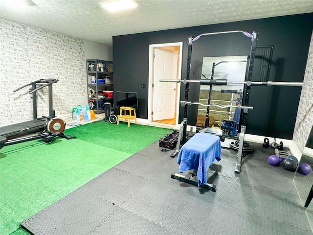 320 Kentshire, Lawrenceville, GA 30044 - workout area with a textured ceiling