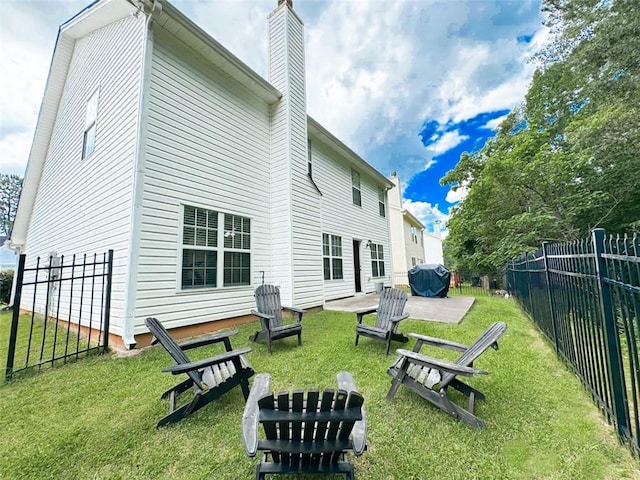 320 Kentshire, Lawrenceville, GA 30044 - back of property with a yard and a patio area
