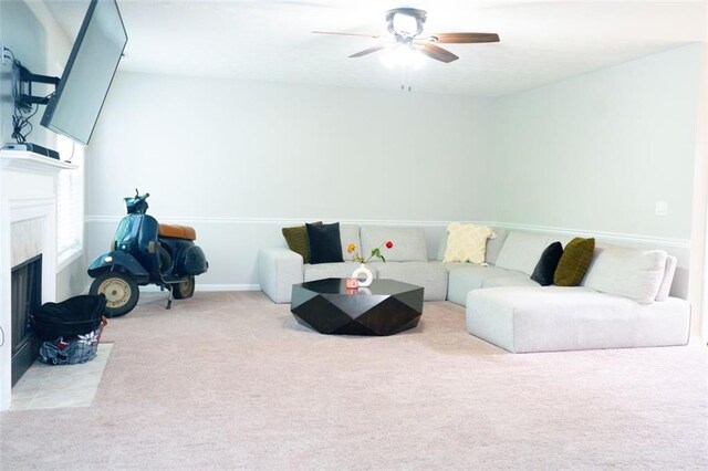320 Kentshire, Lawrenceville, GA 30044 - living room featuring light carpet, a premium fireplace, and ceiling fan