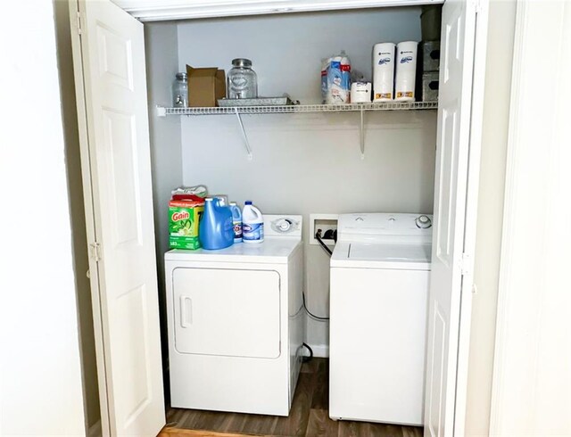 320 Kentshire, Lawrenceville, GA 30044 - laundry room featuring washing machine and dryer and dark hardwood / wood-style floors