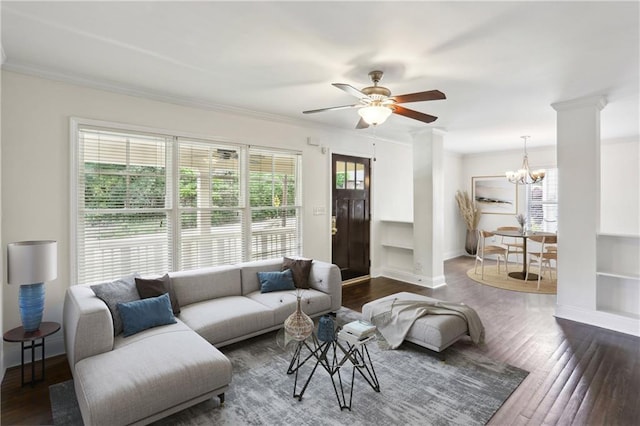 unfurnished room with baseboards, a ceiling fan, dark wood finished floors, and visible vents