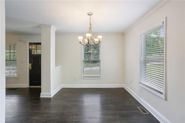 unfurnished bedroom with ornamental molding, baseboards, dark wood-style floors, and a closet