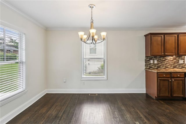 unfurnished living room featuring baseboards, visible vents, a wealth of natural light, and dark wood-type flooring