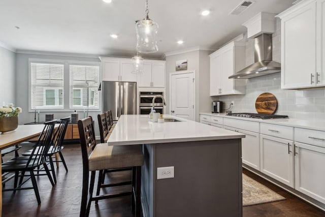 243 Retreat Ln, Canton, GA 30114 - kitchen featuring ornamental molding, a sink, light countertops, tasteful backsplash, and a kitchen bar