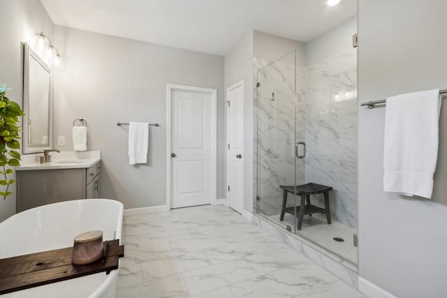 243 Retreat Ln, Canton, GA 30114 - bathroom with a marble finish shower, marble look tile flooring, a freestanding tub, vanity, and baseboards