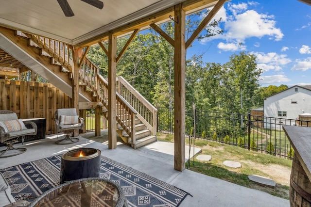 243 Retreat Ln, Canton, GA 30114 - view of patio / terrace with stairway, a fire pit, and ceiling fan