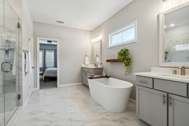 243 Retreat Ln, Canton, GA 30114 - full bathroom featuring marble finish flooring, a marble finish shower, two vanities, and baseboards