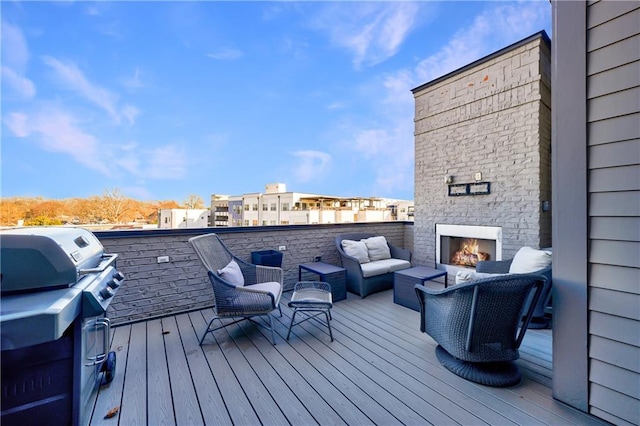 661 Auburn Ave NE Unit 10, Atlanta, GA 30312 - deck with grilling area and an outdoor living space with a fireplace