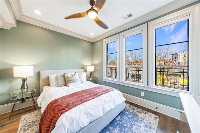 661 Auburn Ave NE Unit 10, Atlanta, GA 30312 - bedroom with ornamental molding, wood finished floors, and a ceiling fan
