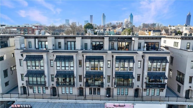 661 Auburn Ave NE Unit 10, Atlanta, GA 30312 - view of building exterior featuring a view of skyline