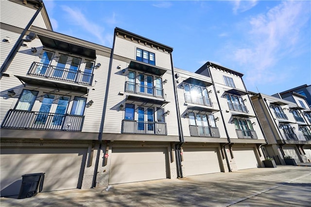 661 Auburn Ave NE Unit 10, Atlanta, GA 30312 - view of apartment building / complex featuring a garage and driveway