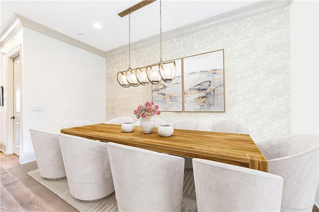 661 Auburn Ave NE Unit 10, Atlanta, GA 30312 - dining space featuring wood finished floors, ornamental molding, a chandelier, and recessed lighting