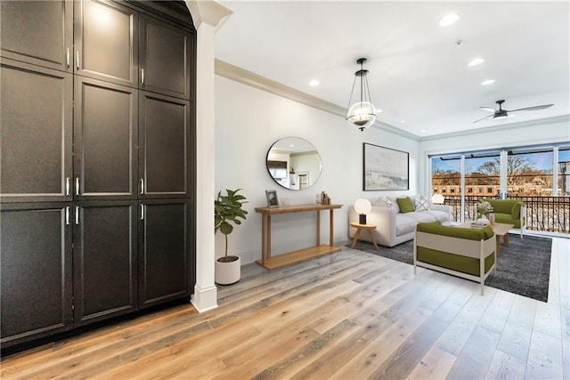 661 Auburn Ave NE Unit 10, Atlanta, GA 30312 - living room featuring ornamental molding, light wood-style floors, recessed lighting, and a ceiling fan