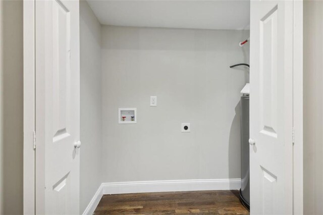 washroom with hookup for a washing machine, dark hardwood / wood-style flooring, and hookup for an electric dryer