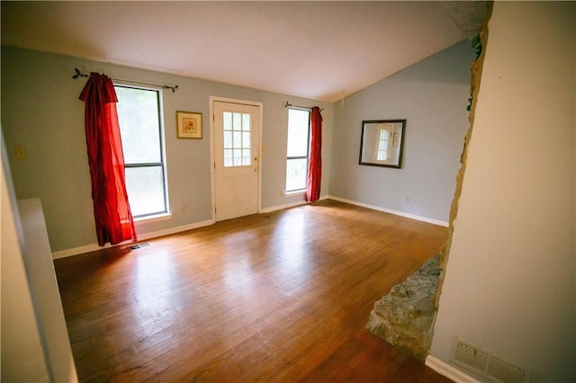 4190 Heather Way, Cumming, GA 30041 - empty room featuring wood finished floors, baseboards, and lofted ceiling
