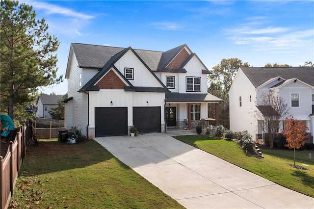 modern farmhouse featuring a garage and a front lawn