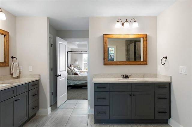 bathroom with vanity and tile patterned flooring