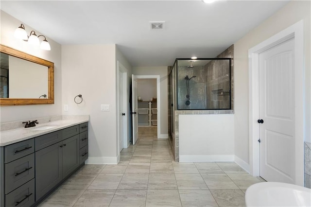 4 Doe Ct SE, Cartersville, GA 30120 - full bathroom with a stall shower, vanity, marble finish flooring, baseboards, and a spacious closet