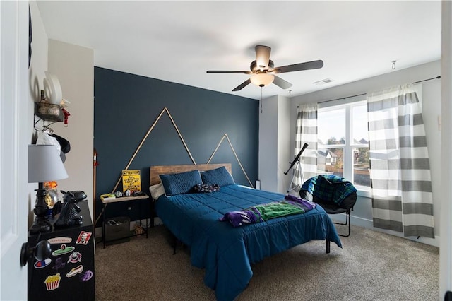 carpeted bedroom with ceiling fan