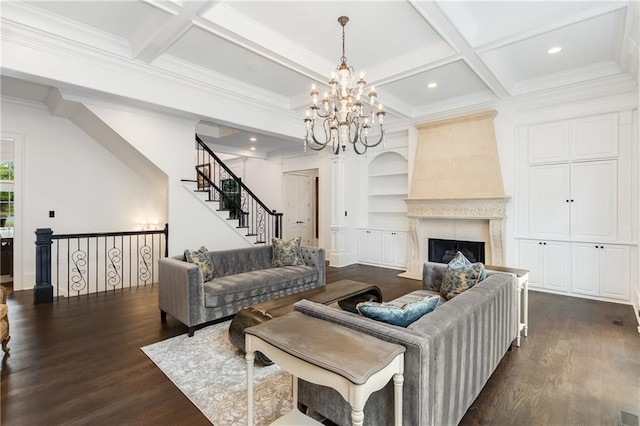 living room with coffered ceiling, beamed ceiling, ornamental molding, a fireplace, and dark hardwood / wood-style flooring