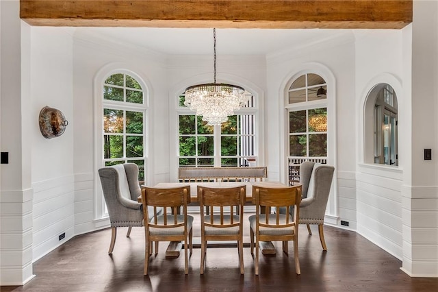 dining space featuring an inviting chandelier, beamed ceiling, and dark hardwood / wood-style flooring