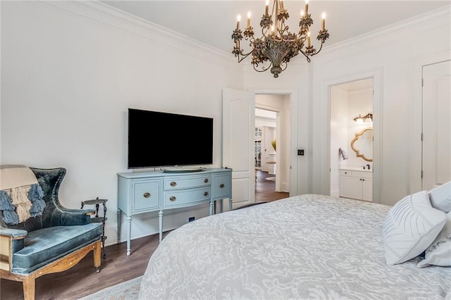 bedroom with dark wood-type flooring, ensuite bathroom, a notable chandelier, and ornamental molding