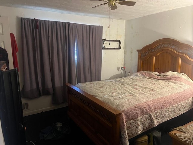 10199 Starr St SW, Covington, GA 30014 - bedroom with a textured ceiling and a ceiling fan