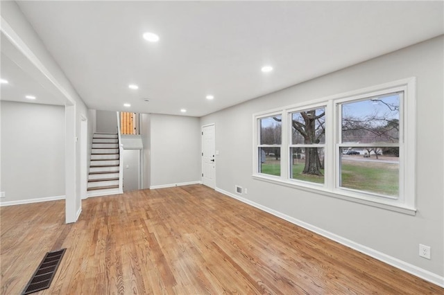 basement featuring light hardwood / wood-style floors