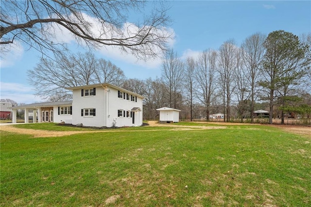 view of property exterior featuring a lawn and a storage unit