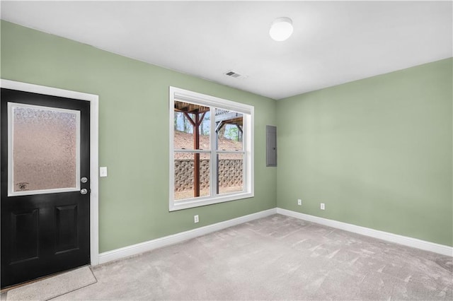 5748 Pine Oak Dr NW, Norcross, GA 30092 - carpeted foyer with baseboards, visible vents, and electric panel