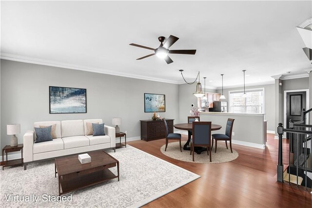 5748 Pine Oak Dr NW, Norcross, GA 30092 - living area featuring dark wood-type flooring, ceiling fan, crown molding, and baseboards