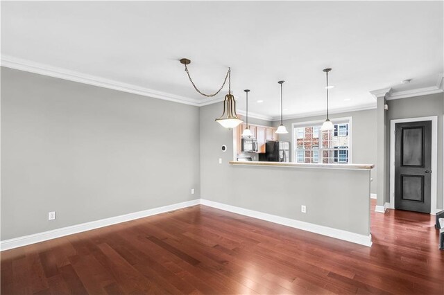 5748 Pine Oak Dr NW, Norcross, GA 30092 - interior space with wood finished floors, stainless steel microwave, freestanding refrigerator, and baseboards