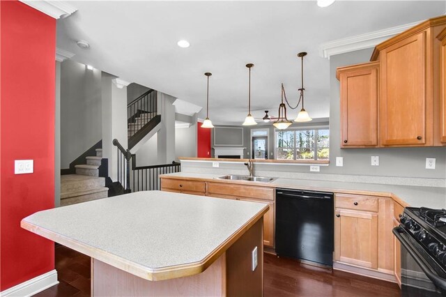 5748 Pine Oak Dr NW, Norcross, GA 30092 - kitchen with dark wood finished floors, light countertops, black appliances, a sink, and a center island