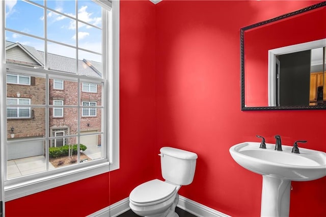 5748 Pine Oak Dr NW, Norcross, GA 30092 - bathroom featuring baseboards and toilet