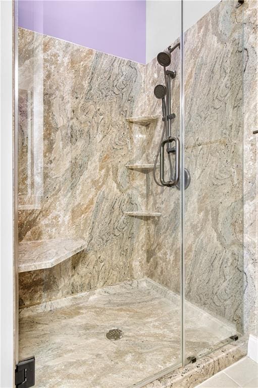 5748 Pine Oak Dr NW, Norcross, GA 30092 - bathroom featuring a marble finish shower