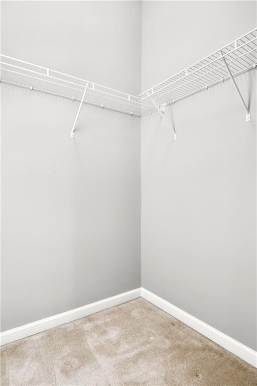 5748 Pine Oak Dr NW, Norcross, GA 30092 - spacious closet featuring carpet