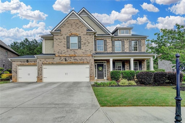 4191 Secret Shoals Way, Buford, GA 30518 - craftsman-style home featuring concrete driveway, brick siding, a front lawn, and a garage
