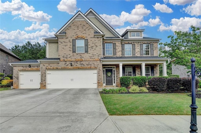 4191 Secret Shoals Way, Buford, GA 30518 - view of front of home featuring concrete driveway, brick siding, a front lawn, and a garage