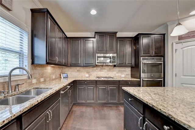 4191 Secret Shoals Way, Buford, GA 30518 - kitchen featuring a sink, appliances with stainless steel finishes, dark wood finished floors, crown molding, and dark brown cabinetry