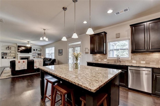 4191 Secret Shoals Way, Buford, GA 30518 - kitchen with stainless steel dishwasher, a sink, a ceiling fan, dark wood-type flooring, and crown molding