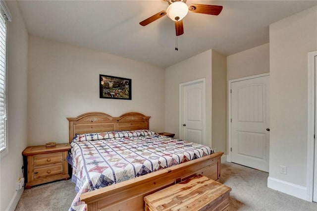 4191 Secret Shoals Way, Buford, GA 30518 - bedroom with light colored carpet, baseboards, and ceiling fan