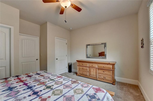 4191 Secret Shoals Way, Buford, GA 30518 - bedroom featuring light colored carpet, baseboards, and a ceiling fan