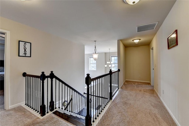 4191 Secret Shoals Way, Buford, GA 30518 - corridor with an upstairs landing, carpet floors, and baseboards