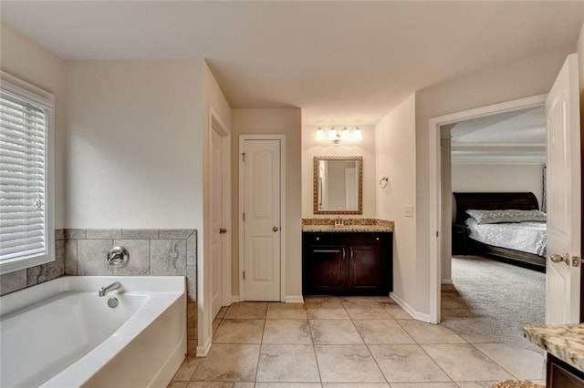 4191 Secret Shoals Way, Buford, GA 30518 - ensuite bathroom with vanity, a garden tub, plenty of natural light, and tile patterned flooring