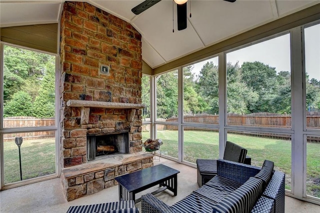 4191 Secret Shoals Way, Buford, GA 30518 - sunroom / solarium featuring a stone fireplace, a ceiling fan, lofted ceiling, and plenty of natural light