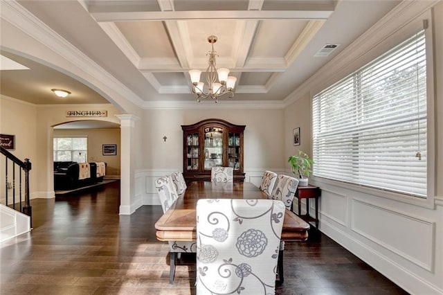 4191 Secret Shoals Way, Buford, GA 30518 - dining room with arched walkways, a chandelier, ornate columns, dark wood-style floors, and stairway