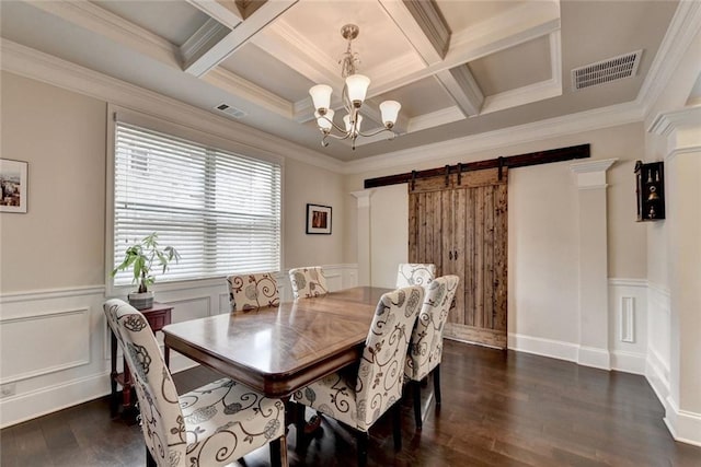 4191 Secret Shoals Way, Buford, GA 30518 - dining space featuring a chandelier, coffered ceiling, dark wood-style floors, wainscoting, and a barn door